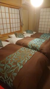 เตียงในห้องที่ Tsukitei1