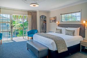 Postel nebo postele na pokoji v ubytování Silver Fern Rotorua Suites & Spa