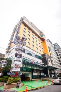 a large building with orange cones in front of it at Hotel Noblesse in Seoul +24 photos