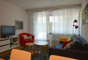 TV a/nebo společenská místnost v ubytování Apartment in Casa Caral - Flims Waldhaus