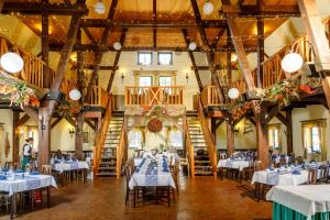 Ein Restaurant oder anderes Speiselokal in der Unterkunft Pension Kräutermühlenhof Burg 