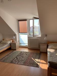 Posteľ alebo postele v izbe v ubytovaní apartment