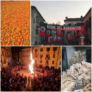a group of people gathered around a fire festival at CameLia in Ivrea