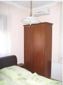 Cama o camas de una habitación en Németi Apartmanház