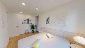Voodi või voodid majutusasutuse Lieblingsplatz Neusiedl Appartement - Entspann dich toas