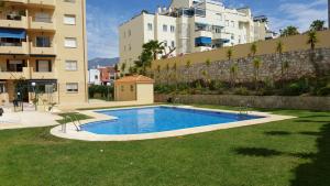 Bazén v ubytovaní APARTAMENTO VIÑUELA alebo v jeho blízkosti