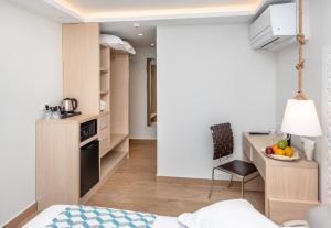 Kuchyň nebo kuchyňský kout v ubytování Triton Boutique Hotel