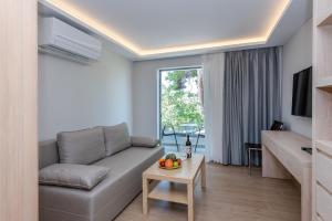 Posezení v ubytování Triton Boutique Hotel