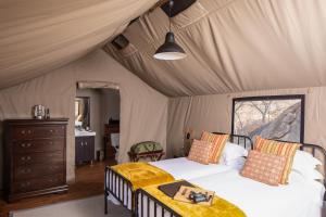 Postelja oz. postelje v sobi nastanitve Abelana Safari Camp