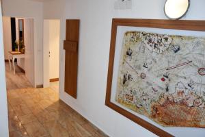 a map hanging on a wall in a room at Comfort Apartments by Livingdowntown in Zürich