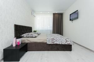 Posteľ alebo postele v izbe v ubytovaní Luxury apart-hotel on Kharkovskaya near Lavina 1 floor