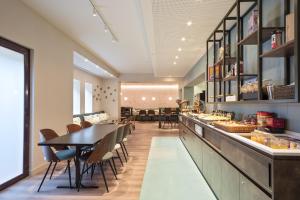 Restaurace v ubytování Hotel Via Augusta
