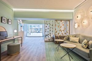 Posezení v ubytování Hotel Via Augusta