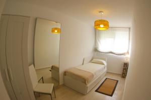 a small bedroom with a bed and a mirror at ¡¡NAUTILUS HIGH QUALITY!! in Carboneras +16 photos