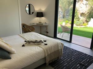 Postel nebo postele na pokoji v ubytování Pavillon de la Trinité + 22 fotografií