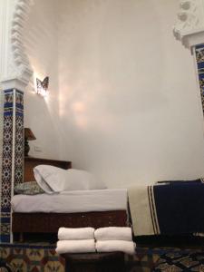 Voodi või voodid majutusasutuse Riad Soul of Tetouan toas