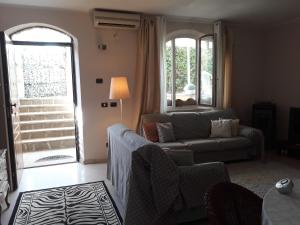 Posedenie v ubytovaní Casa in collina "la farfalla"