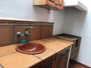 Kuchyň nebo kuchyňský kout v ubytování Primera línea en piscinas naturales.