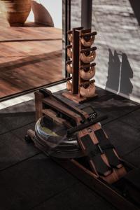 a pile of shoes sitting on the floor in front of a mirror at OKU Ibiza in San Antonio