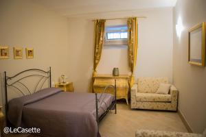 Katil atau katil-katil dalam bilik di Le Casette