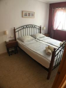 En eller flere senge i et værelse på Casa Vromans Alto