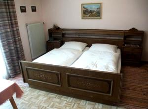 Postel nebo postele na pokoji v ubytování Pension Stubachblick