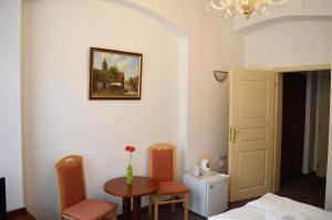 Ein Bett oder Betten in einem Zimmer der Unterkunft Hotel Petr