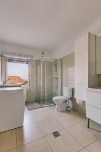 Kúpeľňa v ubytovaní Villa Georgina + 27 fotografií