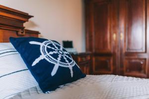 A bed or beds in a room at Villa Georgina