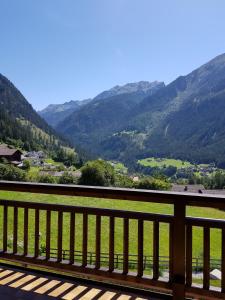 a view of a valley from a balcony at Ferienwohnungen Haas in Jerzens