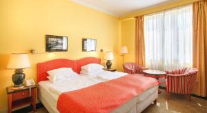 Postel nebo postele na pokoji v ubytování Dvorak Spa & Wellness