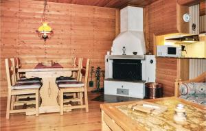 a kitchen with a table and a stove at Cozy Home In Lima With Wifi in Lima