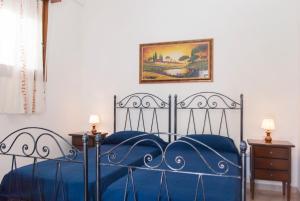 Ліжко або ліжка в номері Affittacamere Room and Breakfast Antonuccio