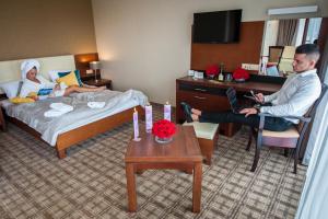 Łóżko lub łóżka w pokoju w obiekcie Hotel Rudnik