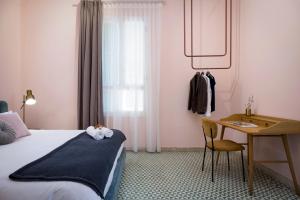 Ένα ή περισσότερα κρεβάτια σε δωμάτιο στο Hotel Lost Gemmayzeh