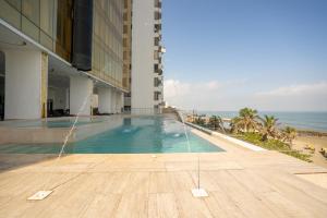 Bazén v ubytování Hotel Cartagena Dubai nebo v jeho okolí