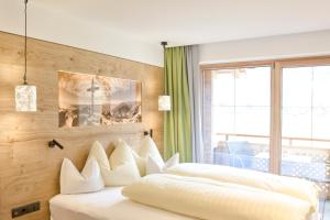 Postel nebo postele na pokoji v ubytování Ferienhotel Sonnenhof