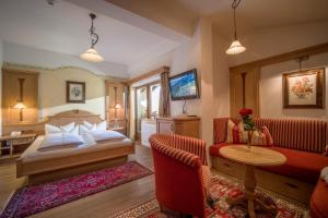 Postel nebo postele na pokoji v ubytování Ferienhotel Sonnenhof