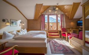 Postel nebo postele na pokoji v ubytování Ferienhotel Sonnenhof + 37 fotografií