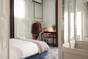 Ένα ή περισσότερα κρεβάτια σε δωμάτιο στο Hotel Lost Gemmayzeh