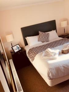En eller flere senge i et værelse på The Swan Hotel