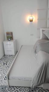 Postelja oz. postelje v sobi nastanitve Soderberg By J&J Homes At Amani Grand Resort Residences Near Airport