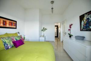 En eller flere senge i et værelse på Apartamento en Playa Chica, Las Gaviotas