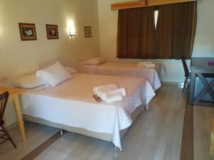 Postel nebo postele na pokoji v ubytování Encanto Rural