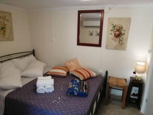 A bed or beds in a room at Rodomelo Cute Studio 1