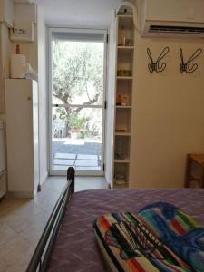 A bed or beds in a room at Rodomelo Cute Studio 1