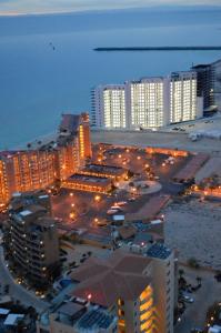 an aerial view of a city at night with buildings at ESMERALDA LUXURY #603B in Puerto Peñasco
