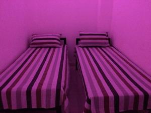 Postel nebo postele na pokoji v ubytování RR House
