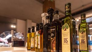 a row of bottles of alcohol sitting on a counter at TUI Blue Isla Cristina Palace - Adults Recommended in Isla Cristina