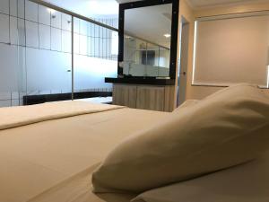 Ένα ή περισσότερα κρεβάτια σε δωμάτιο στο Aki Hotel